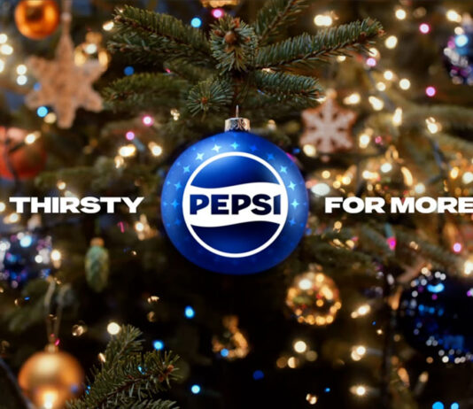Pepsi kicks off Christmas campaign A Christmas tree with a blue bauble hanging from its branch with the Pepsi logo on it and surrounding text that reads "Thirsty For More".