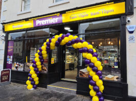 Premier opens up in Dunbar Front entrance to Premier Dunbar with a balloon arch outside the front door made with yellow and purple balloons.