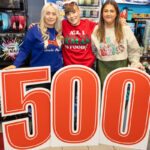 Spar Greenock is in the Christmas spirit Staff members from Ardgowan Hospice and Spar Greenock stand behind a large 500 sign in the Spar Greenock store.