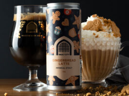 Vault City toasts Tesco listing for Gingerbread Latte Stout A can of Vault City Gingerbread Latte Stout stands on a table in front of a Vault City branded glass and a bowl with a gingerbread latte in it with whipped cream and gingerbread biscuit.