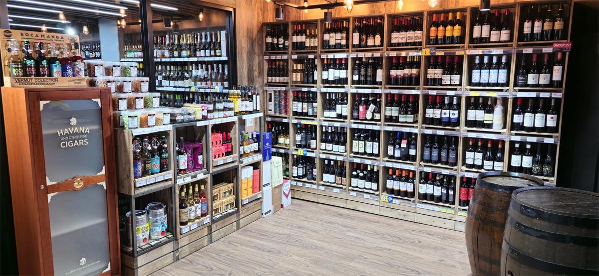 Selection of wine across wooden cases.