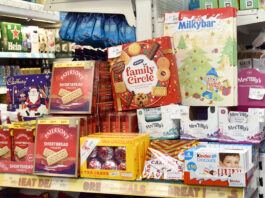 Inflation sustains for the end of 2024 A selection of biscuits and chocolates on promotion in a store during the Christmas period.