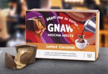 A pack of Gnaw Salted Caramel Mocha Melts sits on a table with one of the melts broken open with caramel pouring out next to the box.