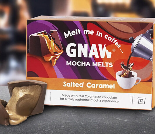 Velvet indulgence with Gnaw coffee solutions A pack of Gnaw Salted Caramel Mocha Melts sits on a table with one of the melts broken open with caramel pouring out next to the box.