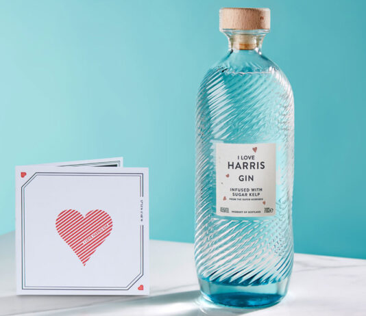 From Harris with Love: Isle of Harris unveils Valentine’s Gin A bottle of Isle of Harris Love Gin stands next to a card with a love heart on it.