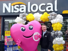 Nisa donates over £1million through its charity Nisa's Making a Difference Locally mascot Maddie stands outside of Nisa Local store during a store opening event.