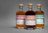 Tailored Spirits The Experimental Series range including Experiment 1 AXIS, Experiment 2 BUCK and Experiment 3 CLAW all stand against a grey background.