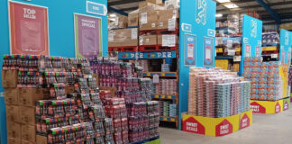 Interior shot of a Hancocks depot displaying massive pallets of confectionery brands.