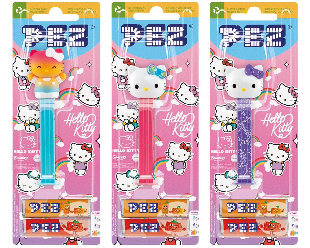 Pack shots of Hello Kitty PEZ dispensers featuring Hello Kitty heads including a Rainbow coloured one, a red coloured one and a purple coloured one.