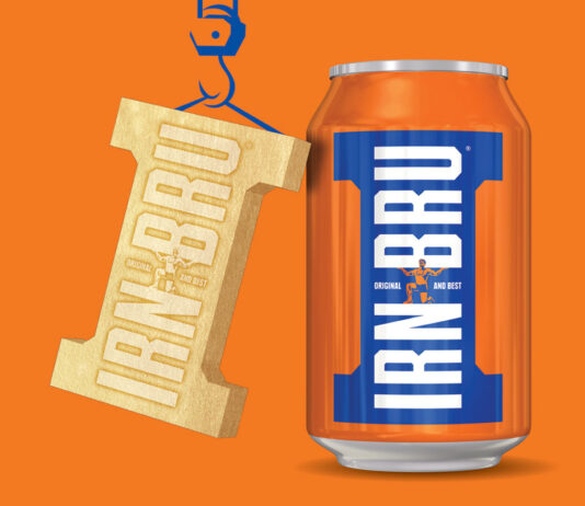 Irn-Bru strikes Gold in new consumer campaign A can of Irn-Bru stands against an orange background with golden Irn-Bru Girder design hangs next to it, suspended by a drawing of a crane.