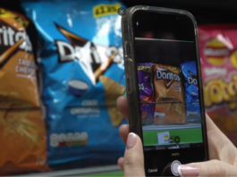 Creating an always-on connection between brands and independent retailers app scanning items in shop