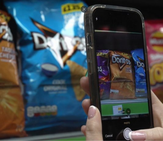 Creating an always-on connection between brands and independent retailers app scanning items in shop