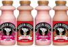 Pack shots of Shaken Udder Raspberry Ripple and Shaken Udder Scoff-the-Lot milkshakes.