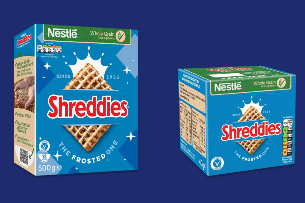 Pack shots of multipacks of Shreddies The Frosted One against a dark blue background.