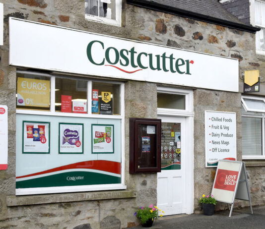Bestway empowers retailers with social media initiative The front entrance of a Costcutter store featuring signage for the symbol group as well as signage for the Post Office.