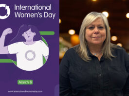 International Women’s Day – Booker Group An image of a poster for International Women's Day is to the left with Karen Mulesh, catering sales controller at Booker, to the right of the image.