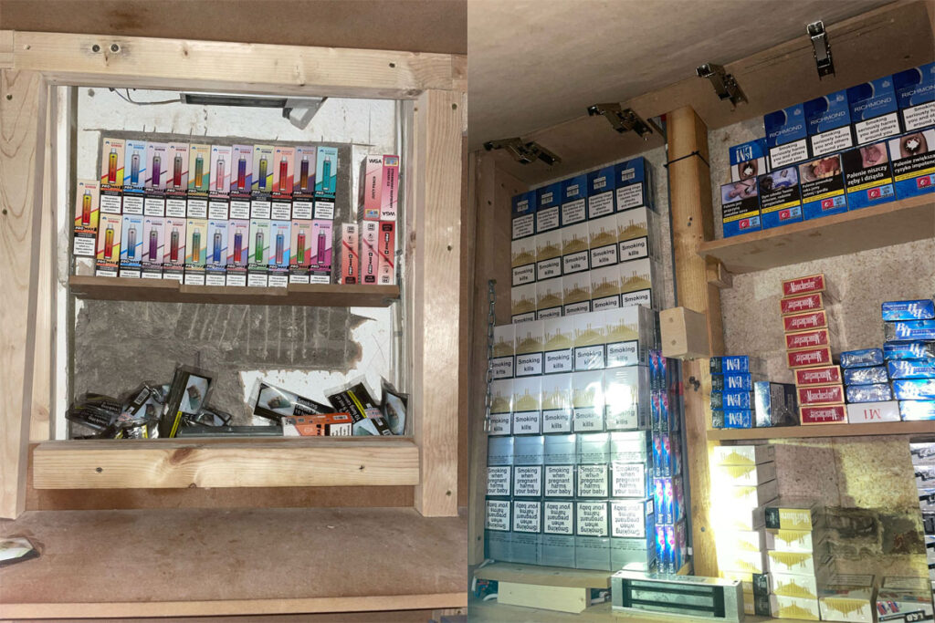 A range of illicit nicotine products including cigarettes, vapes and roll your own tobacco in a hidden cupboard compartment.