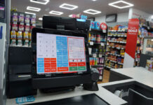 A till screen in a convenience store featuring the MPos software.