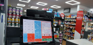 A till screen in a convenience store featuring the MPos software.