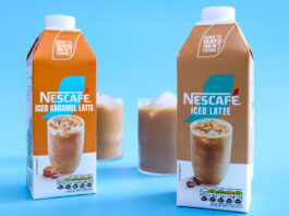 Nescafé launches new Iced Latte coffee cartons Cartons of Nescafé Iced Latte and Iced Caramel Latte stand against a blue background with the drinks poured out into ribbed glasses behind the cartons with ice.