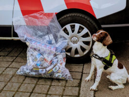 Illegal tobacco haul in Aberdeen raid Tobacco sniffer dog Rosie sits in front of an Aberdeen City Council van with a bag of illegal tobacco products.