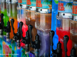 Children under 8 should avoid slushies, say medics A range of slushie machines with bright colours are lined up containing slushie drinks of different flavours.