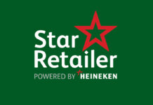 A logo for Star Retailer powered by Heineken is against a green background with a red five-point star in the logo.