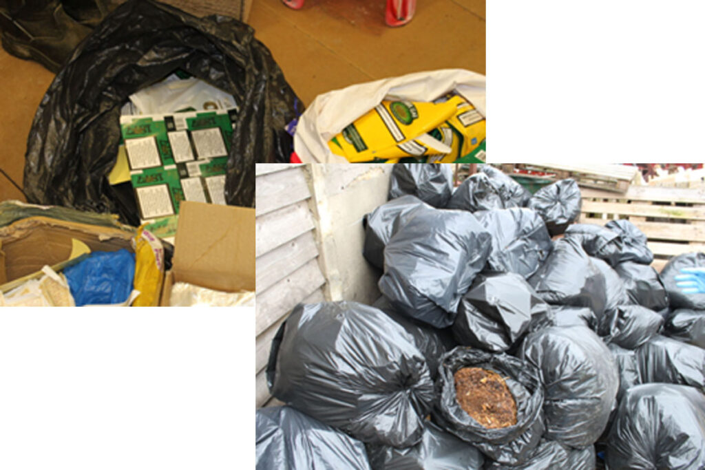 Packets of illegal tobacco products in bin bags as well as tonnes of loose tobacco in bin bags.