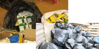 Packets of illegal tobacco products in bin bags as well as tonnes of loose tobacco in bin bags.