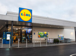 Lidl eyes up Scottish stores expansion The front of a Lidl store with the discounter's logo on a sign above the glass door entrance.