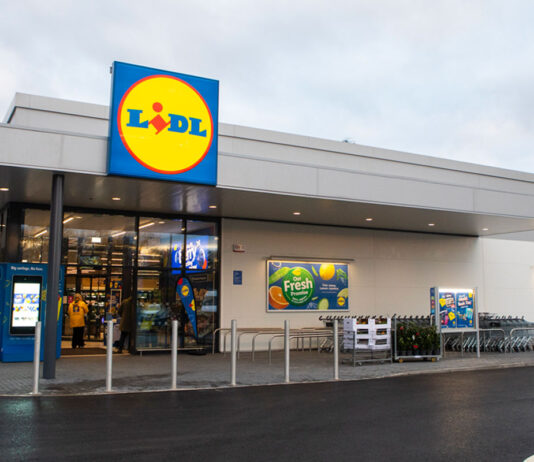 Lidl eyes up Scottish stores expansion The front of a Lidl store with the discounter's logo on a sign above the glass door entrance.