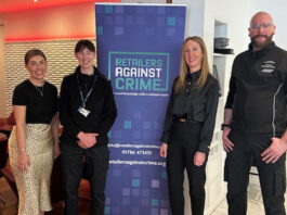 Retailers Against Crime highlight scourge at seminar RAC Intelligence Co-ordinator Natasa Wilson, PC Evelyn Hegarty, RAC National Operations Manager Stephanie Karte and a John Lewis Profit Protection Partner (L to R) stand around a Retailers Against Crime display.