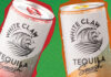 White Claw Tequila Smash cans are against a green background with a red outline on the Strawberry Lime variant and an orange outline on the Mango Passionfruit variant.