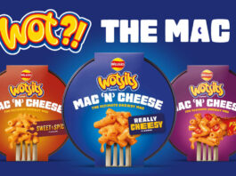 Wotsits expands beyond crisps with new Mac N Cheese meals Packs of Wotsits Mac N Cheese variants including Mac N Cheese Really Cheesy flavour, Mac N Cheese Flamin' Hot and Mac N Cheese Sweet & Spicy. The three variants are against a blue background with text at the top reading 'Wot?! The Mac'.