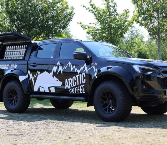 Arctic Coffee gears up for new campaign with Isuzu An Arctic Coffee branded Izuzu D-Max Arctic Truck is parked with its side window open with bottles of the chilled coffee available for sale.