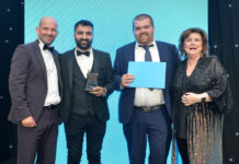 Premier RaceTrack Pitstop Bearsden accepting the award for Vaping Retailer of the Year at the Scottish Grocer Awards 2024.