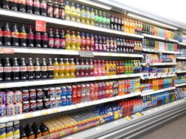 Inflation spikes upwards to 4.1% A range of soft drinks sitting in chillers in a store.