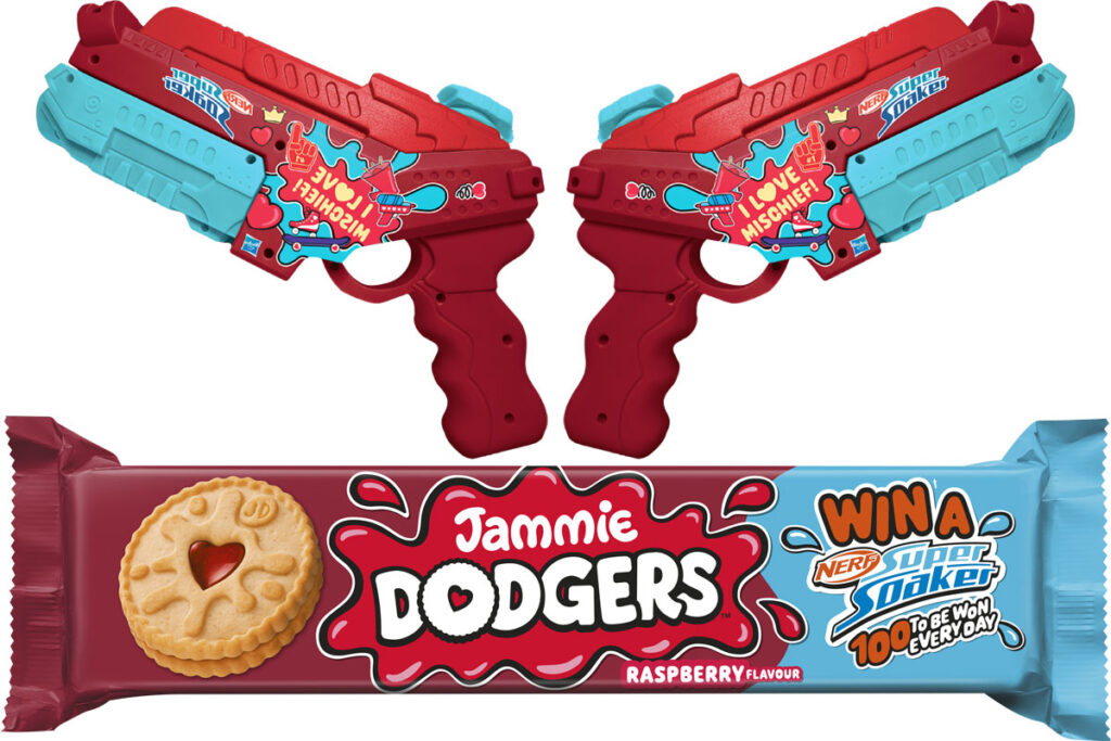 A pair of Jammie Dodgers branded Nerf SuperSoakers sit above a packet of Jammie Dodgers with an on-pack callout for a collaborative competition between the biscuit brand and Hasbro's Nerf guns.