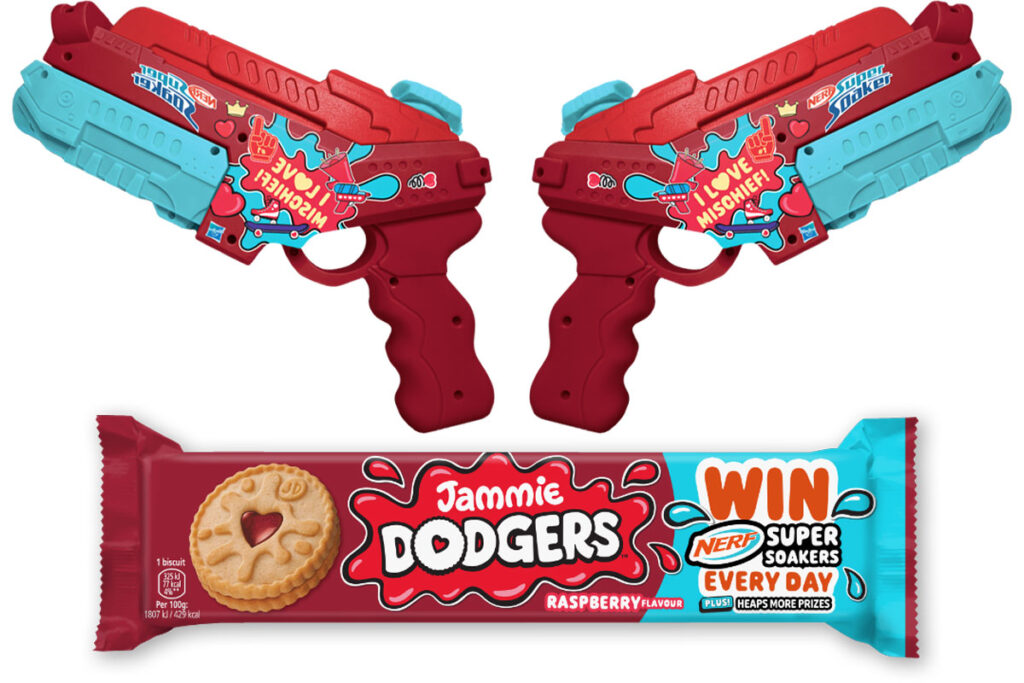 A pair of Jammie Dodgers branded Nerf SuperSoakers sit above a packet of Jammie Dodgers with an on-pack callout for a collaborative competition between the biscuit brand and Hasbro's Nerf guns.