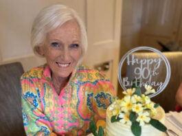 Finsbury marks Mary Berry’s 90th birthday with a personal cake TV personality and baker Mary Berry sits at a table with the 90th Birthday cake that Finsbury Food Group had made for her.