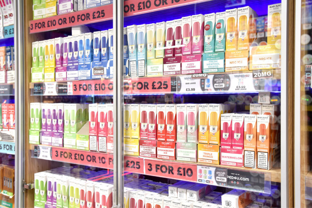 A range of Nicotine Salts products in a glass cabinet.