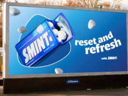 Perfetti Van Melle freshens up sales with Mentos and Smint campaigns A billboard at a train station with the Smint summer campaign 2025 on it. The tagline reads 'Reset and Refresh'.