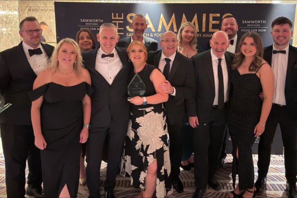 The Scotmid team at the Sammies award celebrating their double award win.