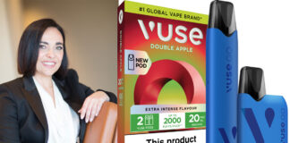 Susanna de Lesu, commercial director at BAT UK&I, with pack shots of VUSE Doube Apple pods and devices.