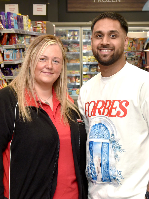 Daniall Nadeem and Danielle, store owner and staff manager at Spar Motherwell Road