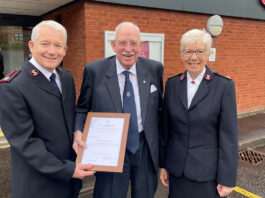Salvation Army bestows its highest civilian award to Sir Boyd Tunnock Sir Boyd Tunnock receiving his award from the Salvation Army