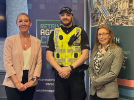 Retailers Against Crime urges Stirling retailers to sign up to crime-fighting tool A police officer stands between two women with signage behind them for Retailers Against Crime and Go Forth Stirling.