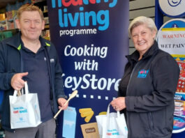Filshill partners with Healthy Living Programme on summer campaign A member of the KeyStore team and a member of the Healthy Living Programme team stand inside a KeyStore shop holding bags as part of a recipe meal initiative with the KeyStore estate.