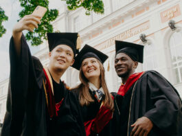 Leverhulme Trade Charities Trust opens up applications for 2025/26 university undergraduate grants Three university graduates stand together taking a selfie.
