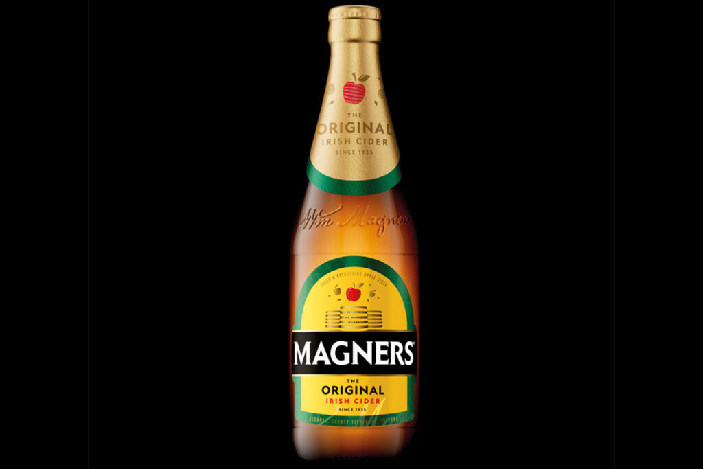 Bottle of 2025 redesign for Magners cider against a black background.